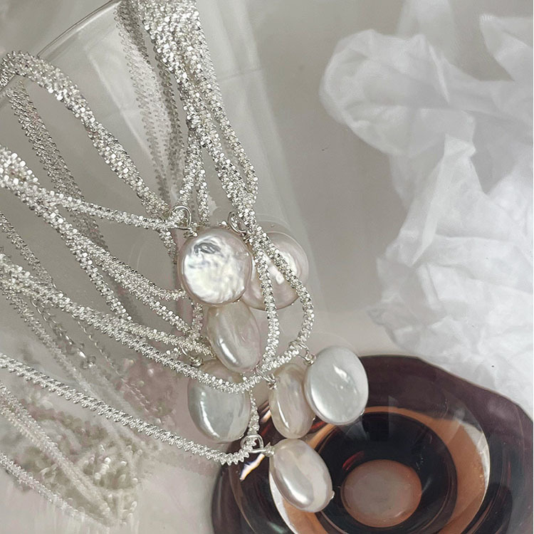 Comment ça sonne : 🌟 Collier Élégant en Argent Sterling S925 - Perle Baroque, Sophistication Intemporelle?En espérant que cela réponde à vos attentes. 🎁