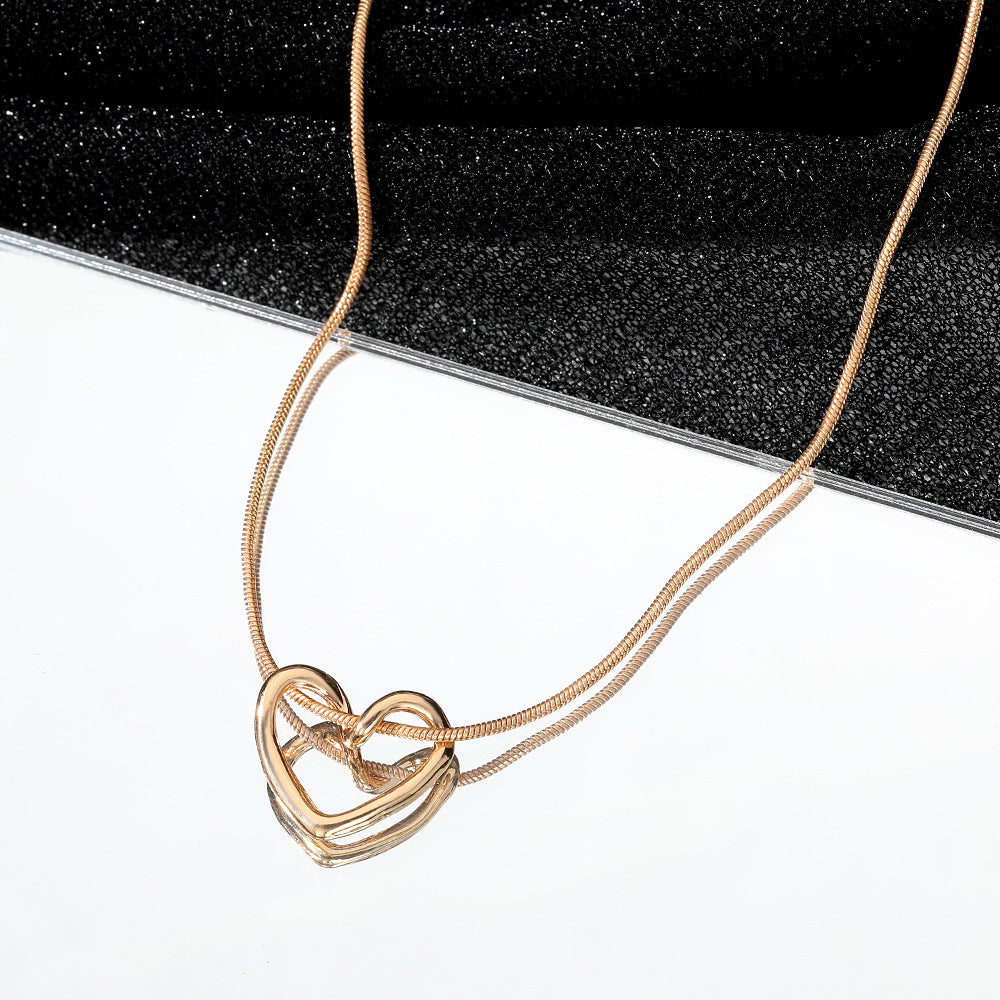 Collier en Cœur Creux pour Femmes - Élégant et Raffiné, Parfait pour Toutes les Occasions
