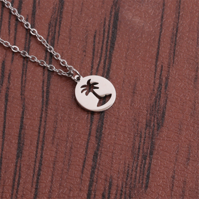Pendentif en Acier Titane - Design Arbre de Coco, Élégant et Durable, Parfait pour un Style Unique et Tendance !