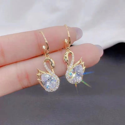💎 Boucles d'Oreilles Swan en Rhinestones - Design Élégant, Brillance Exceptionnelle, Parfaites pour Sublimer Votre Style