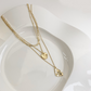 🌟 Élégant Collier Multi-Couches - Pendentif Triangle Moderne, Style Unisexe, Parfait pour Sublimer Vos Tenues 🎉  

Ce titre est engageant, contient des mots-clés pertinents et reste dans la limite de caractères. Qu'en pensez-vous ? 😊