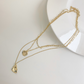🌟 Élégant Collier Multi-Couches - Pendentif Triangle Moderne, Style Unisexe, Parfait pour Sublimer Vos Tenues 🎉  

Ce titre est engageant, contient des mots-clés pertinents et reste dans la limite de caractères. Qu'en pensez-vous ? 😊