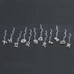 Élégantes Boucles d’Oreilles Constellation - Design Ondulé Raffiné, Sublimez Votre Style avec Une Touche Astrale